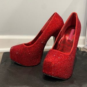 Red rhinestone platform pumps